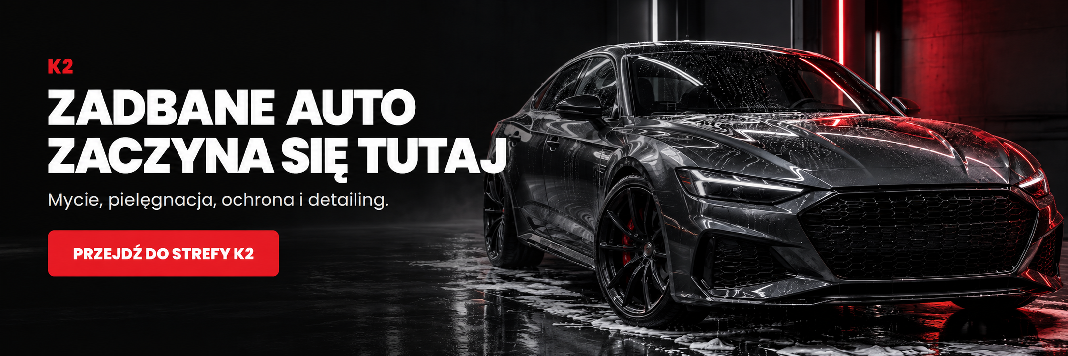 K2 – Zadbane auto zaczyna się tutaj. Kosmetyki samochodowe do mycia, pielęgnacji i detailingu. Grafitowy samochód w studiu detailingowym.